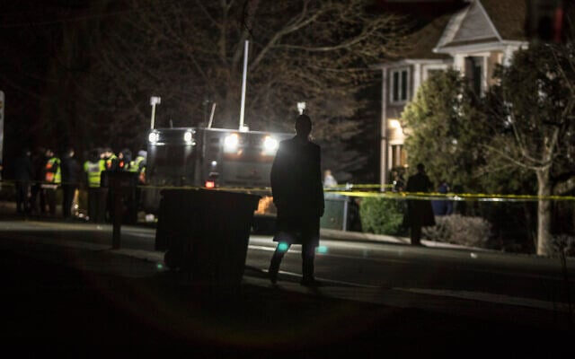 Authorities and first responders gather in front of a residence in Monsey, New York, Sunday, December 29, 2019, following a stabbing spree late Saturday during a Hanukkah celebration in a rabbi's home. (AP Photo/Allyse Pulliam) Authorities and first responders gather in front of a residence in Monsey, New York, Sunday, December 29, 2019, following a stabbing spree late Saturday during a Hanukkah celebration in a rabbi's home. (AP Photo/Allyse Pulliam)