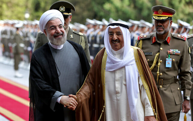 Kuwait's emir Sheik Sabah Al Ahmed Al Sabah, right, shakes hands with Iranian President Hassan Rouhani, left, during an official reception ceremony at the Saadabad Palace in Tehran, Iran, June 1, 2014. (AP Photo/Ebrahim Noroozi) Kuwait's emir Sheik Sabah Al Ahmed Al Sabah, right, shakes hands with Iranian President Hassan Rouhani, left, during an official reception ceremony at the Saadabad Palace in Tehran, Iran, June 1, 2014. (AP Photo/Ebrahim Noroozi)