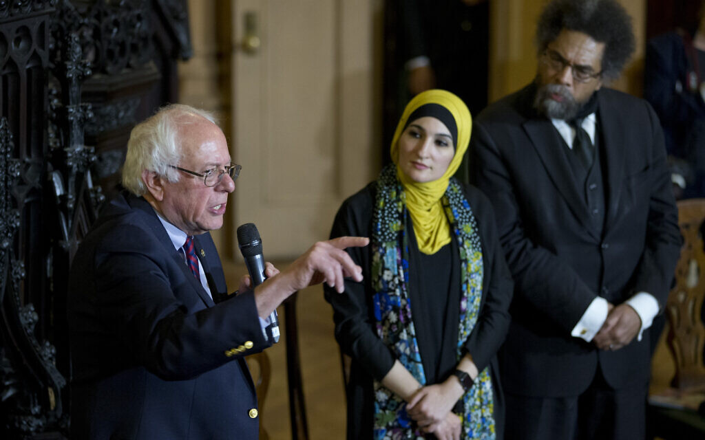 Linda Sarsour, center and Cornel West, right, listen as Democratic presidential candidate Bernie Sanders, I-Vt., speaks in a roundtable discussion at the First Unitarian Congregational Society, Saturday, April 16, 2016, in the Brooklyn borough of New York. (AP Photo/Mary Altaffer) Linda Sarsour, center and Cornel West, right, listen as Democratic presidential candidate Bernie Sanders, I-Vt., speaks in a roundtable discussion at the First Unitarian Congregational Society, Saturday, April 16, 2016, in the Brooklyn borough of New York. (AP Photo/Mary Altaffer)