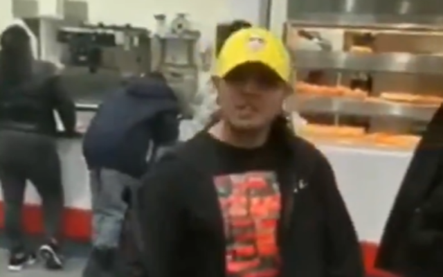 A screen capture from video of a man, identified as Justin Pichizaca, threatening a rabbi at a Costco in Lawrence, Long Island. (Screen capture: Twitter) A screen capture from video of a man, identified as Justin Pichizaca, threatening a rabbi at a Costco in Lawrence, Long Island. (Screen capture: Twitter)