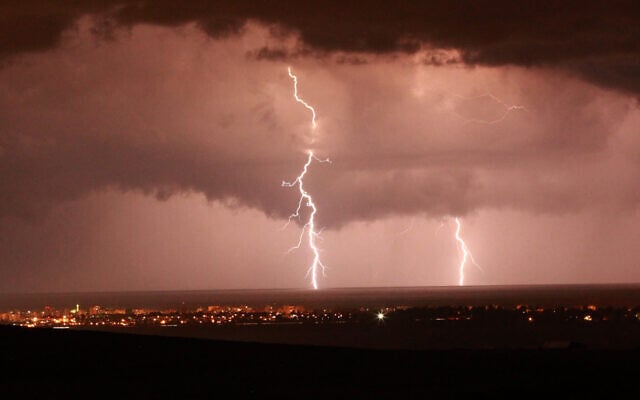Illustrative: Lightning illuminates the sky over Nahariya during a rain storm on October 26 2012. (Yossi Zamir/Flash 90)