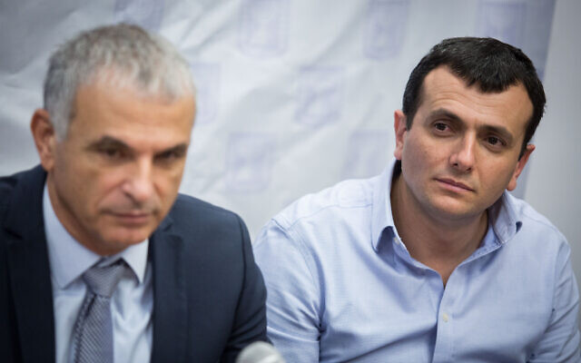 Then-finance minister Moshe Kahlon (R) and Finance Ministry Director General Shai Babad at a press conference in Jerusalem on January 8, 2018. (Hadas Parush/Flash90) Then-finance minister Moshe Kahlon (R) and Finance Ministry Director General Shai Babad at a press conference in Jerusalem on January 8, 2018. (Hadas Parush/Flash90)