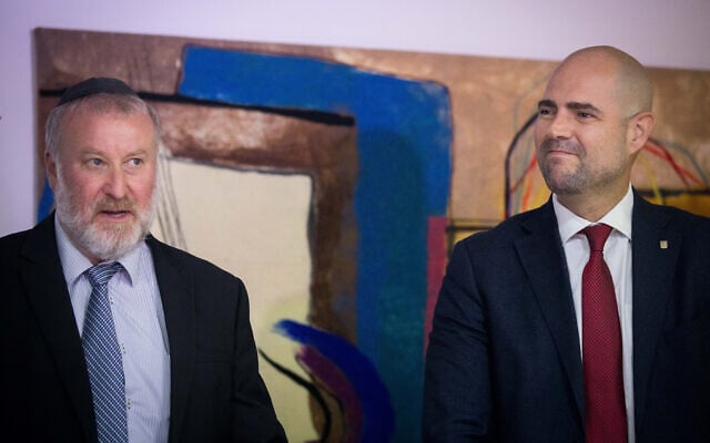 Justice Minister Amir Ohana (R) and Attorney General Avichai Mandelblit at a ceremony marking the former's appointment to the position, at the Justice Ministry in Jerusalem, June 23, 2019. (Yonatan Sindel/Flash90) Justice Minister Amir Ohana (R) and Attorney General Avichai Mandelblit at a ceremony marking the former's appointment to the position, at the Justice Ministry in Jerusalem, June 23, 2019. (Yonatan Sindel/Flash90)