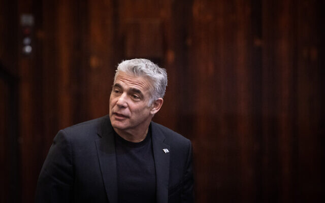 Blue and White party co-chairman MK Yair Lapid during a vote on a bill to dissolve the parliament, at the Knesset, in Jerusalem on December 11, 2019. (Hadas Parush/Flash90) Blue and White party co-chairman MK Yair Lapid during a vote on a bill to dissolve the parliament, at the Knesset, in Jerusalem on December 11, 2019. (Hadas Parush/Flash90)