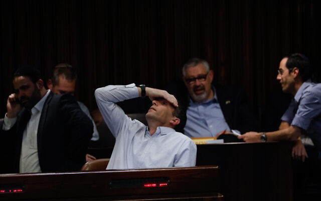 New Right MK Matan Kahana seen during a vote on a bill to dissolve the parliament, at the Knesset, in Jerusalem on December 11, 2019. (Olivier Fitoussi/Flash90) New Right MK Matan Kahana seen during a vote on a bill to dissolve the parliament, at the Knesset, in Jerusalem on December 11, 2019. (Olivier Fitoussi/Flash90)
