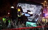 Rescue forces at the scene of a deadly car accident on Route 40 near Ben Gurion International airport, December 22, 2019. (Flash90)