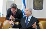 Prime Minister Benjamin Netanyahu with then-Science Minister Ofir Akunis (L) at the start of the weekly cabinet meeting on December 22, 2019, at the Prime Minister's Office in Jerusalem. (Marc Israel Sellem/Pool/Flash90)