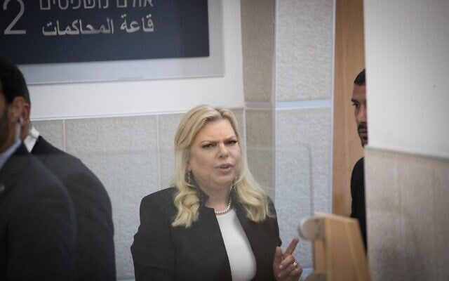 Sara Netanyahu, wife of Prime Minister Benjamin Netanyahu, leaves after a court hearing at the Jerusalem District Labor Court, in lawsuit against her by a former employee at the Prime Minister's Residence, December 23, 2019. (Yonatan Sindel/Flash90 ) Sara Netanyahu, wife of Prime Minister Benjamin Netanyahu, leaves after a court hearing at the Jerusalem District Labor Court, in lawsuit against her by a former employee at the Prime Minister's Residence, December 23, 2019. (Yonatan Sindel/Flash90 )