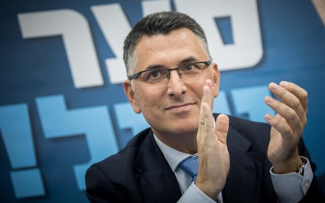 Likud MK Gideon Sa'ar with supporters at a primary campaign event for the Likud leadership, in Jerusalem on December 24, 2019. (Yonatan Sindel/Flash90) Likud MK Gideon Sa'ar with supporters at a primary campaign event for the Likud leadership, in Jerusalem on December 24, 2019. (Yonatan Sindel/Flash90)