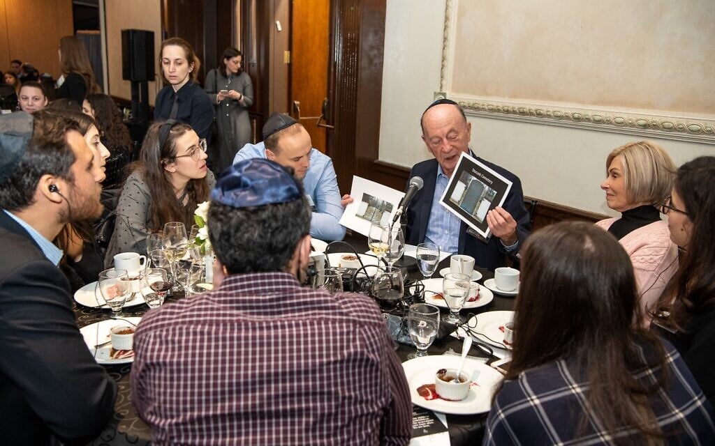 Holocaust survivor Sol Nayman talks about his experiences at the Dinner of Miracles in Toronto, December 15, 2019. (Liora Kogan)