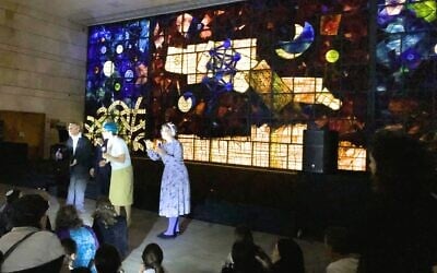 Gershom Sholem, Yeshayahu and Nechama Leibowitz, and Miriam Yalan-Stekelis help bring back the light at the National Library's Night in the Library Hanukkah program, December 23, 2019. (Amanda Borschel-Dan/Times of Israel)