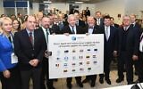 Prime Minister Benjamin Netanyahu meets with visiting pro-Israel lawmakers from 25 countries in Jerusalem on December 9, 2019 (Amos Ben-Gershom/GPO)