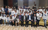 Israeli President Reuven Rivlin hosts 60 tweens and teenagers previously injured in terror attacks for a celebration of their bar and bat mitzvahs in Jerusalem on Thursday December 19, 2019. 
(Kobi Gideon / GPO)