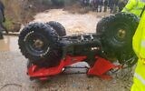 An overturned quad bike pulled from a river bed after a flash flood swept away its two riders, leaving a boy, 14, missing, December 26, 2019 (Israel Fire and Rescue Services)