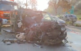 A van totaled in a deadly crash with a truck on Route 4 near the Aluf Sade Junction in Ramat Gan, December 22, 2019. (Screen capture: Twitter)