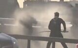 Darryn Frost uses a narwhal tusk against terrorist Usman Khan during a deadly stabbing attack on London Bridge, November 29, 2019. (Screen capture: Twitter)