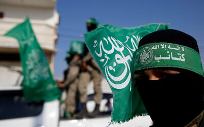 Hamas terrorists march in Khan Younis, southern Gaza Strip, November 11, 2019. (AP Photo/Hatem Moussa)