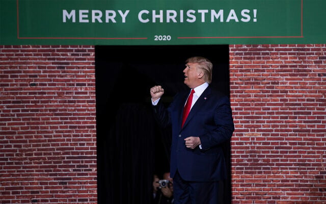 US President Donald Trump speaks during a campaign rally at Kellogg Arena, Wednesday, Dec. 18, 2019, in Battle Creek, Michigan. (AP Photo/ Evan Vucci) US President Donald Trump speaks during a campaign rally at Kellogg Arena, Wednesday, Dec. 18, 2019, in Battle Creek, Michigan. (AP Photo/ Evan Vucci)