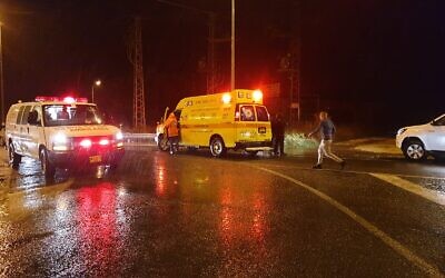 Medics treat a 19-year-old Israeli who was struck by lightning while standing in an open field in northern Israel on December 8, 2019. (Magen David Adom)