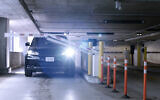 A car exiting a parking lot; Arrive and Israel R&D team seek to find better parking solutions for users (Courtesy)