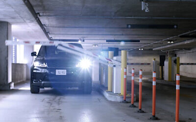 A car exiting a parking lot; Arrive and Israel R&D team seek to find better parking solutions for users (Courtesy) A car exiting a parking lot; Arrive and Israel R&D team seek to find better parking solutions for users (Courtesy)