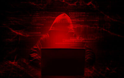 A computer programmer hacking a secure system. (releon8211 via iStock)
