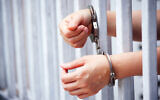 ILLUSTRATIVE- A woman in prison. (iStock)