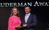 Jay Ruderman presents Marlee Matlin, an Oscar-winning actress who is deaf and Jewish, with the Morton E. Ruderman Award in Tel Aviv, June 19, 2017. (Erez Uzir via JTA)