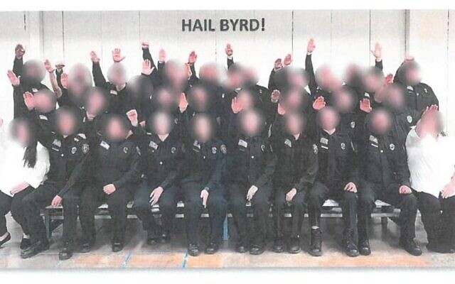 These 34 correction officer trainees from West Virginia were photographed giving a Nazi salute. They were subsequently fired. (West Virginia Department of Military Affairs and Public Safety) These 34 correction officer trainees from West Virginia were photographed giving a Nazi salute. They were subsequently fired. (West Virginia Department of Military Affairs and Public Safety)