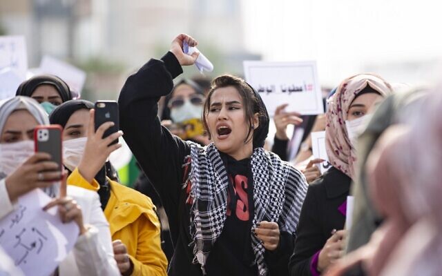 Illustrative: An Iraqi student shouts slogans during an anti-government demonstration in the southern city of Basra on December 31, 2019. (Hussein Faleh/AFP) Illustrative: An Iraqi student shouts slogans during an anti-government demonstration in the southern city of Basra on December 31, 2019. (Hussein Faleh/AFP)