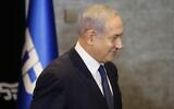 Prime Minister Benjamin Netanyahu leaves a press conference in Jerusalem after announcing his intention to file a request with the Knesset for immunity from prosecution, January 1, 2020. (Gil Cohen-Magen/AFP)