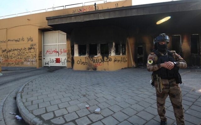 A member of the Iraqi counter-terrorism forces stands guard in front of the US embassy in the capital Baghdad on January 2, 2020. (Ahmad al-Rubaye/AFP) A member of the Iraqi counter-terrorism forces stands guard in front of the US embassy in the capital Baghdad on January 2, 2020. (Ahmad al-Rubaye/AFP)