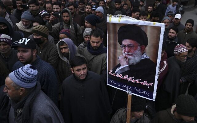 A protester holds a poster with an image of Iranian leader Ayatollah Ali Khamenei during a demonstration against the United States following a US airstrike in Iraq that killed top Iranian commander Qassem Soleimani, in the Kashmiri town of Magam on January 3, 2020. (Tauseef MUSTAFA/AFP) A protester holds a poster with an image of Iranian leader Ayatollah Ali Khamenei during a demonstration against the United States following a US airstrike in Iraq that killed top Iranian commander Qassem Soleimani, in the Kashmiri town of Magam on January 3, 2020. (Tauseef MUSTAFA/AFP)
