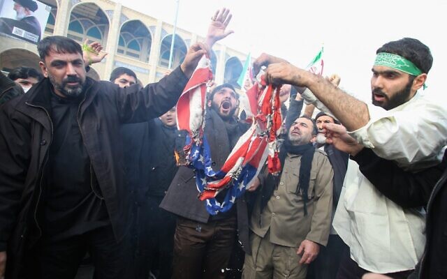 Iranians burn a US flag during a demonstration in Tehran on January 3, 2020, following the killing of Quds Force General Qassem Soleimani in a US strike on his convoy at Baghdad international airport. (Atta Kenare/AFP)