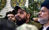 Qais al-Khazali (C) commander of the Asaib Ahl al-Haq pro-Iran faction attends the funeral procession of slain Iraqi paramilitary chief Abu Mahdi al-Muhandis, Iranian military commander Qasem Soleimani and eight others at the Imam Ali Shrine in the shrine city of Najaf in central Iraq, January 4, 2020. (Haidar HAMDANI/AFP)