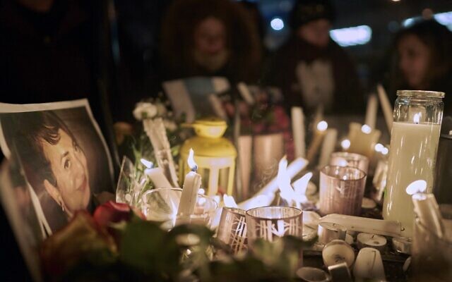 Candles light up a photo of one of the victims of Ukrainian Airlines flight 752 which crashed in Iran earlier, during a vigil at Mel Lastman Square in Toronto, Ontario on January 9, 2020. (Geoff Robins / AFP) Candles light up a photo of one of the victims of Ukrainian Airlines flight 752 which crashed in Iran earlier, during a vigil at Mel Lastman Square in Toronto, Ontario on January 9, 2020. (Geoff Robins / AFP)