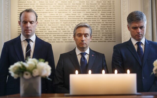 Britain's Foreign Secretary and First Secretary of State Dominic Raab, (L), Canadian Minister of Foreign Affairs Francois-Philippe Champagne (C) and Ukrainian Minister of Foreign Affairs Vadym Prystaiko observe a minute silence to commemorate to commemorate the victims of the Ukrainian plane shot down in Iran before a meeting of the International Coordination and Response Group, at the High Commission of Canada in London, on January 16, 2020. (Tolga Akmen / AFP) Britain's Foreign Secretary and First Secretary of State Dominic Raab, (L), Canadian Minister of Foreign Affairs Francois-Philippe Champagne (C) and Ukrainian Minister of Foreign Affairs Vadym Prystaiko observe a minute silence to commemorate to commemorate the victims of the Ukrainian plane shot down in Iran before a meeting of the International Coordination and Response Group, at the High Commission of Canada in London, on January 16, 2020. (Tolga Akmen / AFP)