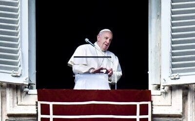 Pope Francis stands at the window of the Apostolic palace overlooking St. Peter's Square during the weekly Angelus prayer on January 19, 2020, in the Vatican. (Alberto PIZZOLI / AFP) Pope Francis stands at the window of the Apostolic palace overlooking St. Peter's Square during the weekly Angelus prayer on January 19, 2020, in the Vatican. (Alberto PIZZOLI / AFP)