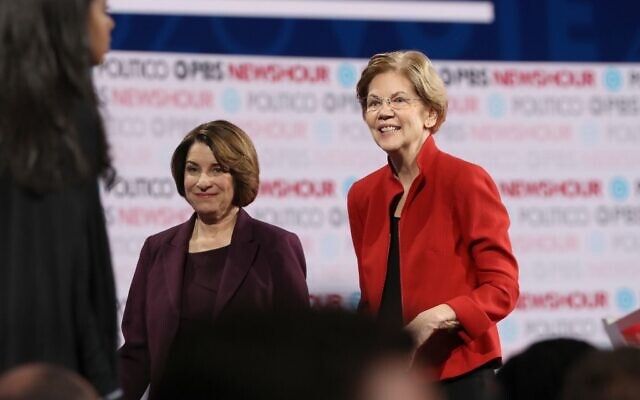In this file photo taken on December 19, 2019, Democratic presidential candidate Senator Elizabeth Warren (D-MA) (R) and Senator Amy Klobuchar (D-MN)) walk on the stage after the Democratic presidential primary debate at Loyola Marymount University in Los Angeles, California (JUSTIN SULLIVAN / GETTY IMAGES NORTH AMERICA / AFP) In this file photo taken on December 19, 2019, Democratic presidential candidate Senator Elizabeth Warren (D-MA) (R) and Senator Amy Klobuchar (D-MN)) walk on the stage after the Democratic presidential primary debate at Loyola Marymount University in Los Angeles, California (JUSTIN SULLIVAN / GETTY IMAGES NORTH AMERICA / AFP)