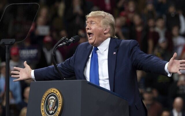US President Donald Trump gestures as he speaks during a 'Keep America Great' campaign rally in Milwaukee, Wisconsin, on January 14, 2020. (SAUL LOEB / AFP) US President Donald Trump gestures as he speaks during a 'Keep America Great' campaign rally in Milwaukee, Wisconsin, on January 14, 2020. (SAUL LOEB / AFP)