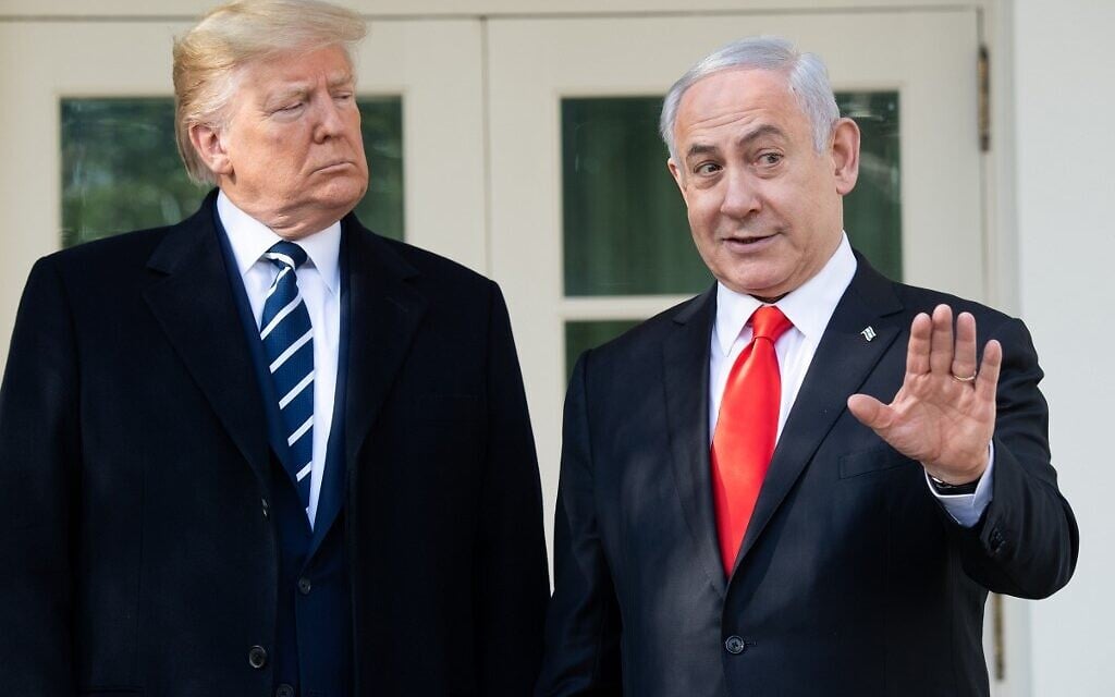 US President Donald Trump and Israeli Prime Minister Benjamin Netanyahu speak to the press on the West Wing Colonnade prior to meetings at the White House in Washington, DC, January 27, 2020. (SAUL LOEB / AFP) US President Donald Trump and Israeli Prime Minister Benjamin Netanyahu speak to the press on the West Wing Colonnade prior to meetings at the White House in Washington, DC, January 27, 2020. (SAUL LOEB / AFP)