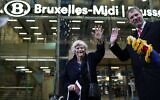 British members of the European Parliament from the Brexit Party Jonathan Bullock (R) and Ann Widdecombe wave in front of the train station as they leave in Brussels on January 31, 2020, Brexit day (Kenzo TRIBOUILLARD / AFP)