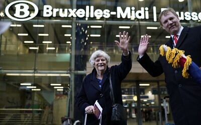 British members of the European Parliament from the Brexit Party Jonathan Bullock (R) and Ann Widdecombe wave in front of the train station as they leave in Brussels on January 31, 2020, Brexit day (Kenzo TRIBOUILLARD / AFP)