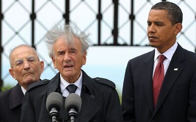 Buchenwald concentration camp survivor Elie Wiesel speaks while then-President Barack Obama and International Buchenwald Committee President Bertrand Herz listen during their visit of the former Buchenwald concentration camp near Weimar, Germany, June 5, 2009 (Pool/Getty Images via JTA)