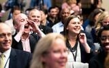 Max Rose, left, and Elissa Slotkin cheer on fellow House freshman in an office lottery on Capitol Hill, November 30, 2018. (Melina Mara/The Washington Post via Getty Images via JTA)