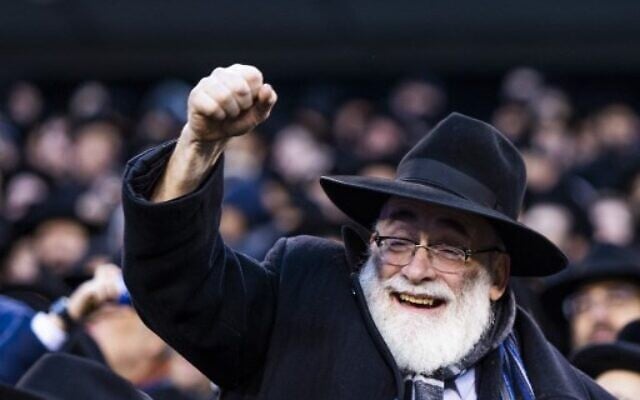An Orthodox Jew attends the 13th Siyum HaShas, a celebration marking the completion of the Daf Yomi, at the MetLife Stadium on January 1, 2020 in East Rutherford, New Jersey. Security was tightened at the event, where the Talmud is read in its entirety, after a rise in anti-Semitic incidents in the area. (Eduardo Munoz Alvarez/Getty Images/AFP)