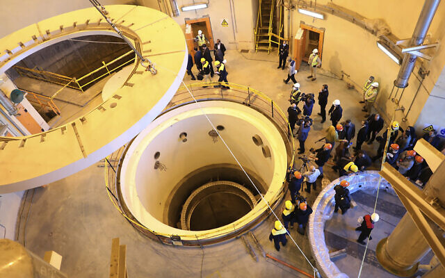 Technicians work at the Arak heavy water reactor's secondary circuit, as officials and media visit the nuclear site, near Arak, 150 miles (250 kilometers) southwest of the capital Tehran, Iran, December 23, 2019. (Atomic Energy Organization of Iran via AP) Technicians work at the Arak heavy water reactor's secondary circuit, as officials and media visit the nuclear site, near Arak, 150 miles (250 kilometers) southwest of the capital Tehran, Iran, December 23, 2019. (Atomic Energy Organization of Iran via AP)