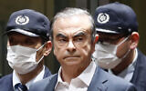 In this April 25, 2019, file photo, former Nissan Chairman Carlos Ghosn leaves Tokyo's Detention Center for bail in Tokyo, Japan. (Kyodo News via AP, File)