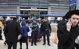 New Jersey State Police officers stand guard in front of MetLife Stadium Wednesday, Jan. 1, 2020, in East Rutherford, N.J., at an event called Siyum HaShas (AP Photo/Ted Shaffrey)