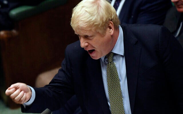 In this handout photo provided by the House of Commons, Britain's Prime Minister Boris Johnson gestures during the first Prime Minister's Questions of the year, in the House of Commons in London, January 8, 2020. (Jessica Taylor/House of Commons via AP) In this handout photo provided by the House of Commons, Britain's Prime Minister Boris Johnson gestures during the first Prime Minister's Questions of the year, in the House of Commons in London, January 8, 2020. (Jessica Taylor/House of Commons via AP)